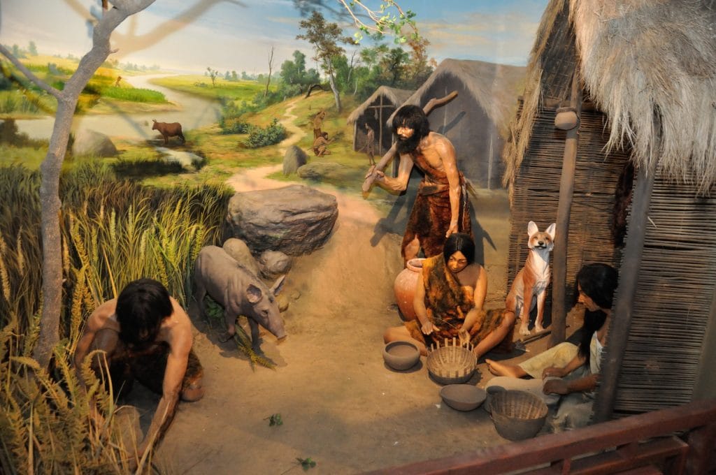 Ilustração da vida humana no período neolítico, próxima à natureza
